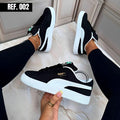 puma negro con blanco re: 002